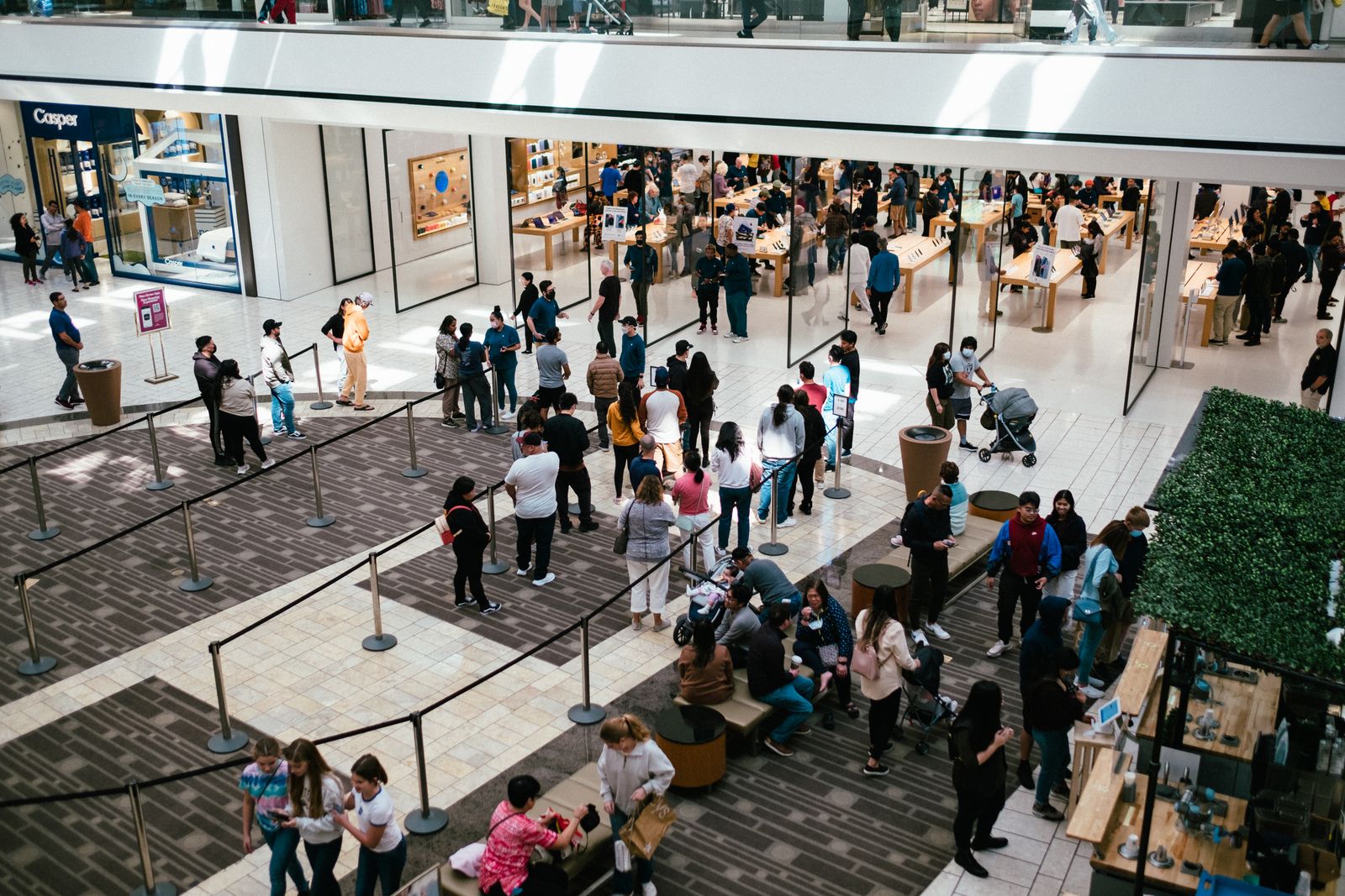 Brand Activations Shoppers gathered in a busy mall concourse during a brand activation campaign
